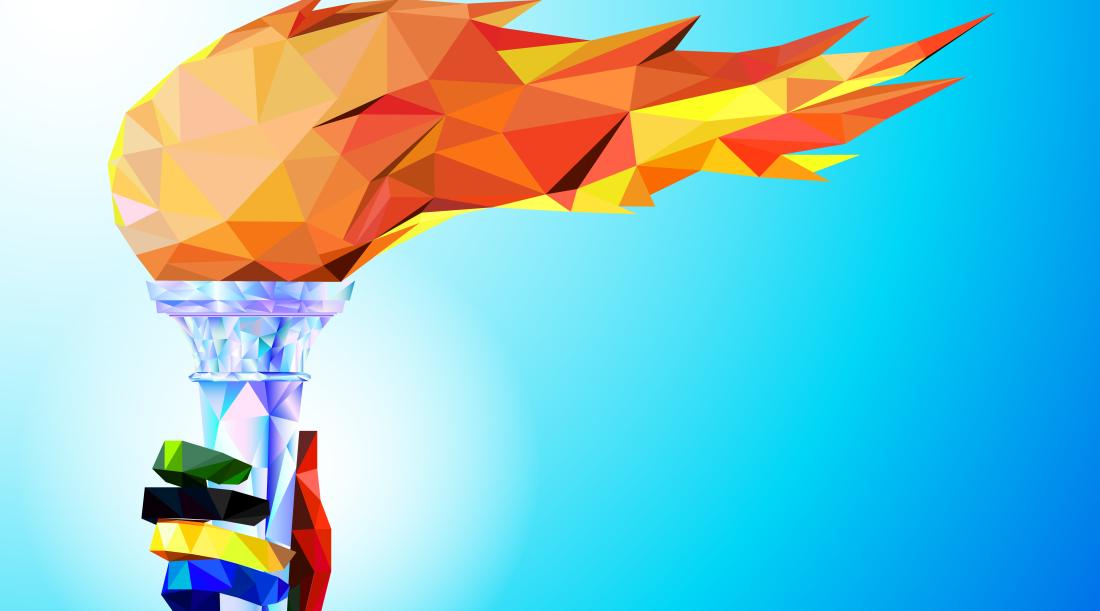A person with multi-colored hands raises the Olympic torch. This is in front of a blue gradient background.